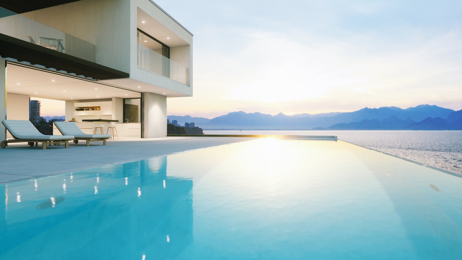 Large-format sintered stone applied across an architectural façade and terrace
